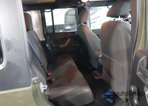 2015 Jeep Wrangler Unlimited Willys Wheeler z USA, uszkodzony, nr VIN 1C4BJWDG8FL753993